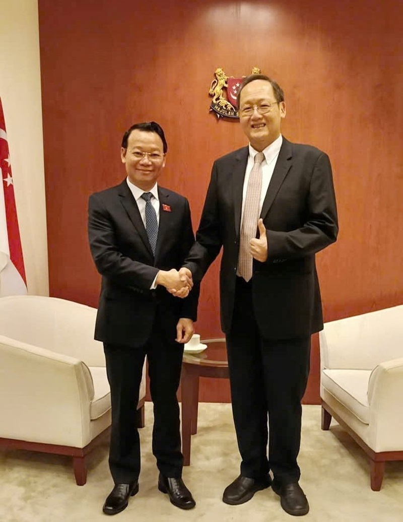 Minister Do Duc Duy holds talks with Singapore’s Minister for Manpower and Minister for Trade and Industry